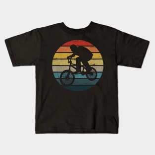 BMX Bicyclist Silhouette On A Distressed Retro Sunset print Kids T-Shirt